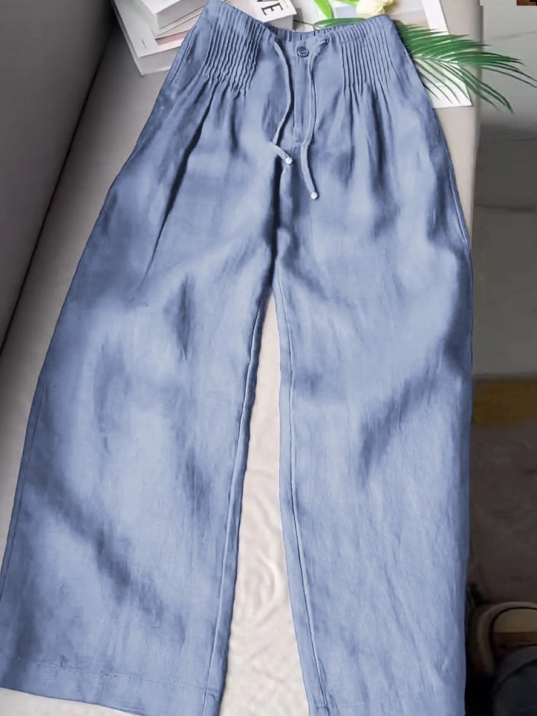 Miriam | Women's linen pleated pants with adjustable waist, wide legs, and solid color for a casual and relaxed style
