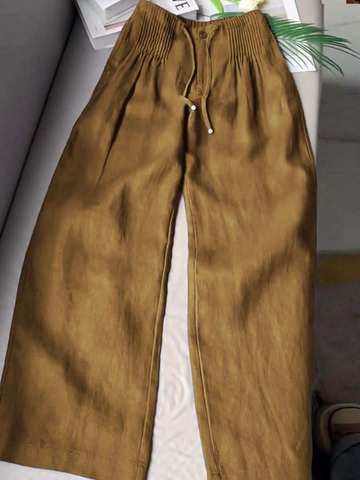 Miriam | Women's linen pleated pants with adjustable waist, wide legs, and solid color for a casual and relaxed style