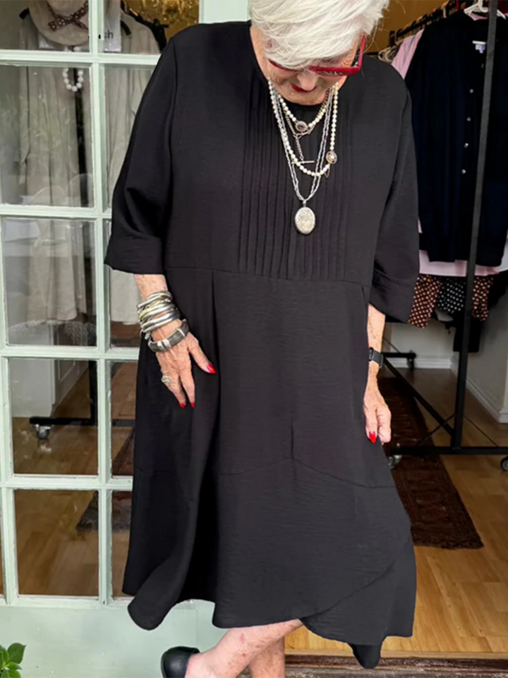 Hannah | Linen dress with accordion pleats and irregular hem for a chic and casual style