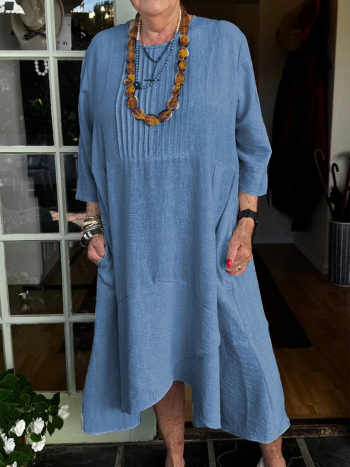 Hannah | Linen dress with accordion pleats and irregular hem for a chic and casual style