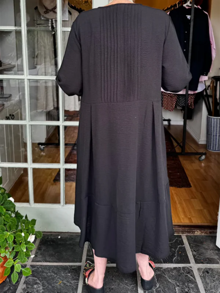 Hannah | Linen dress with accordion pleats and irregular hem for a chic and casual style